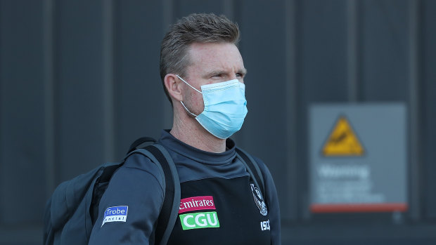 Nathan Buckley in mask mode last year.