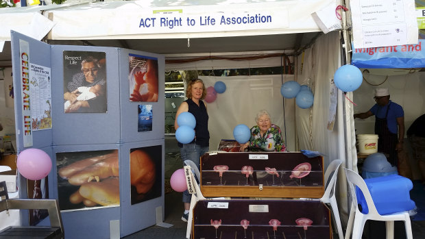 ACT Right to Life Association member Anne Hartwell (pictured left) and association president Bev Cains (pictured right) in their stall at the National Multicultural Festival in 2018.