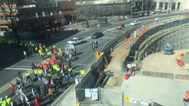 Union members march on the Assembly in support of a proposed local jobs code. 