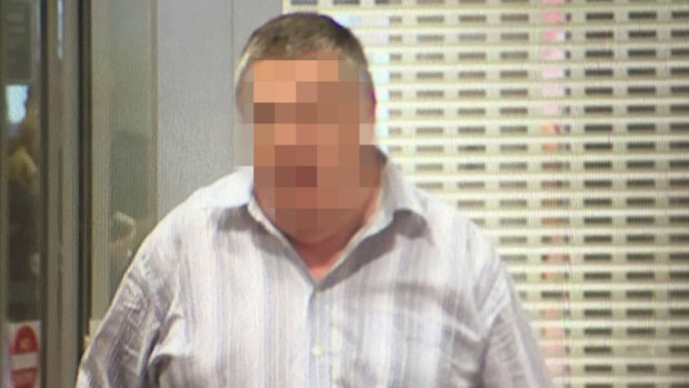 The man accused of Cheryl Grimmer's murder as extradited to NSW from Victoria last year. 