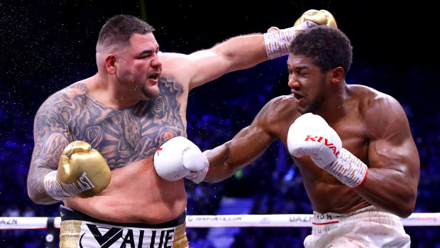 Anthony Joshua gets inside Andy Ruiz Jr during the IBF, WBA, WBO and IBO title bout at the Diriyah Season.