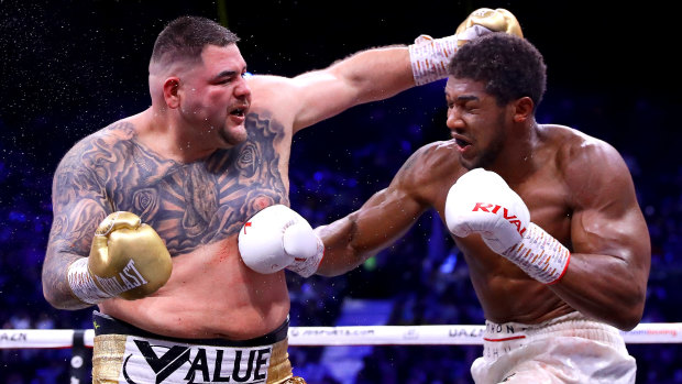 Anthony Joshua connects with a body shot on Andy Ruiz.