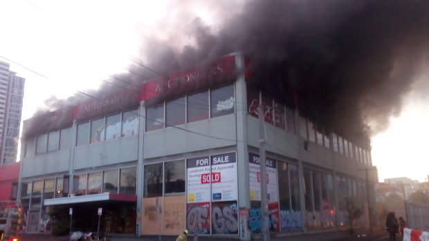 Fire has broken out in a multi-storey building on the corner of Buckhurst and Kerr Streets in  South Melbourne.