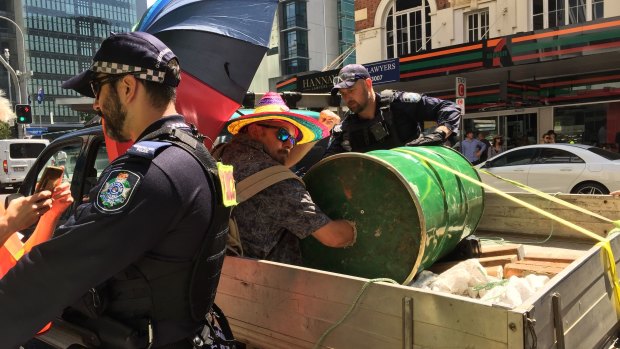 Another Extinction Rebellion protester had sealed his arms into a barrel on the back of a ute on Wednesday.