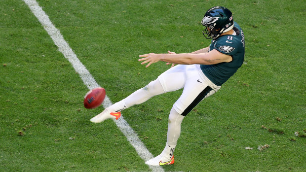 Australia’s Arryn Siposs, a former AFL player with St Kilda, punts for the Eagles during the Super Bowl.