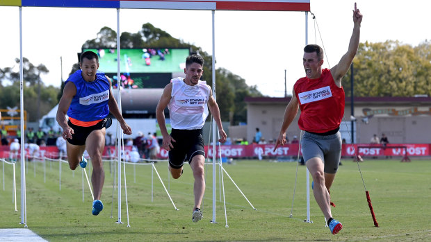 Jacob Despard (far right) crosses the finish line to win the 2018 Stawell Gift.