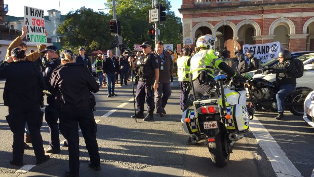 Climate change protesters blockaded the intersection of George and Margaret streets just before 8am.