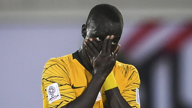 Peace of mind: Awer Mabil sends a message after scoring against Syria on Tuesday.