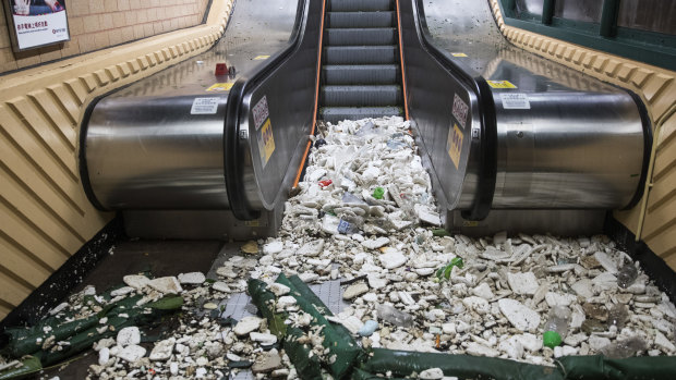 Debris lies at the bottom of an escalator in Hong Kong, China.