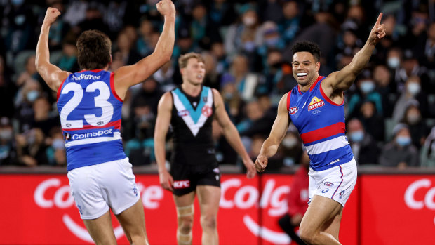 Laitham Vandermeer and Jason Johannisen celebrate.