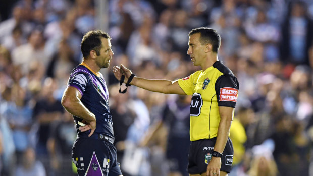 Say what?: Storm skipper Cameron Smith and Matt Cecchin do battle in round four.