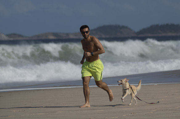 Beaches such as Copacabana are open for exercise but closed for sunbathing.