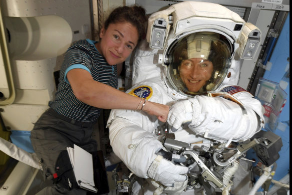 NASA astronauts Christina Koch, right, and, Jessica Meir on the International Space Station.