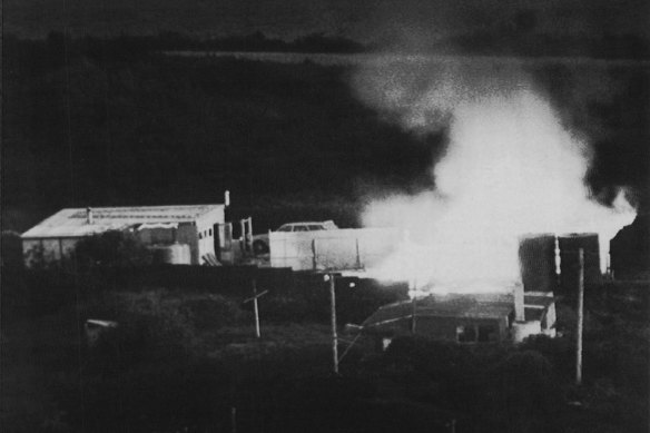 A house on fire in Aramoana during the  rampage.