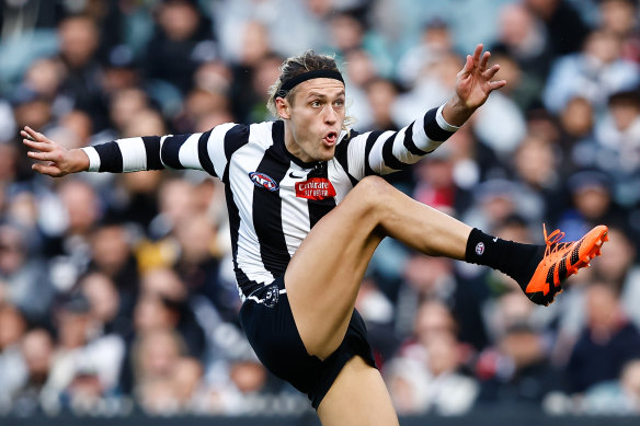 Captain Darcy Moore missed training with an elbow infection.