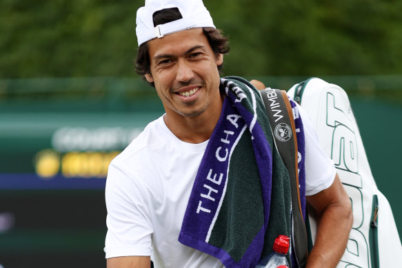 Jason Kubler celebrates after winning match point against Dennis Novak of Austria.