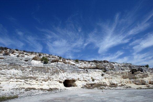 The limestone quarry and its cave for shelter.