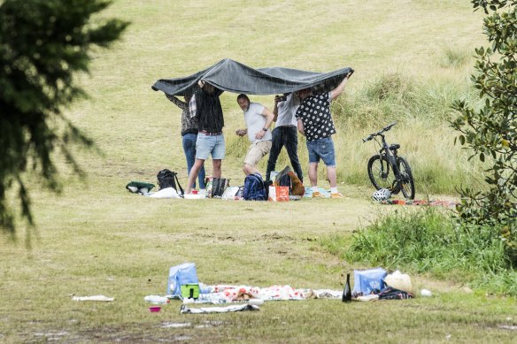 Brief spells of rain dampened the mood at some of Sydney’s picnics. 