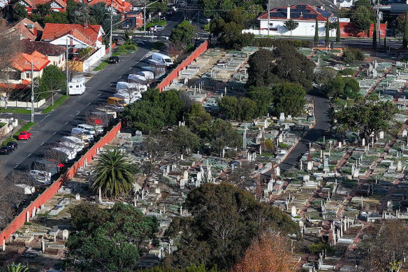 Vans and caravans parked alongside the St Kilda cemetery on Friday. 