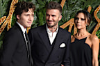 Brooklyn Beckham, David Beckham and Victoria Beckham arrive at The Fashion Awards 2018 In Partnership With Swarovski at Royal Albert Hall on December 10, 2018 in London
