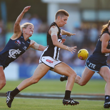 Emma Grant in action for Collingwood in the first AFLW game.