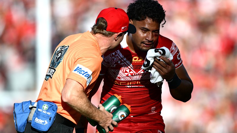 One week on, Eli Katoa remains in hospital. Tonga’s coach has been at his bedside every day
