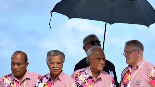(L-R) Kiribati's President Taneti Maamau, Cook Islands Prime Minister Henry Puna, Tonga's Prime Minister Akilisi Pohiva and Australia's Prime Minister Scott Morrison wait to pose for the family photo before the Leaders Retreat at the Pacific Islands Forum in Funafuti, Tuvalu.