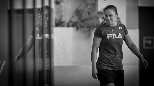 Ash Barty on her way to face the media in Brisbane after announcing her retirement.