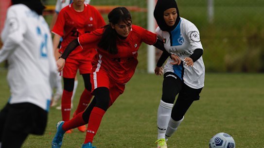 Action between Melbourne and Sydney at the Wanderers Football Stadium.
