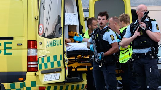 Paramedics and police outside the Field’s shopping centre in Orestad, Copenhagen.