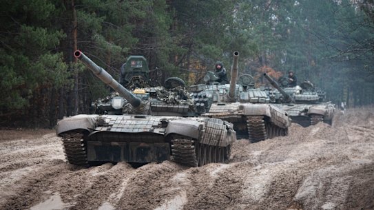 Ukrainian soldiers on captured Russian tanks T-72 hold military training close to the Ukraine-Belarus border near Chernihiv, Ukraine.