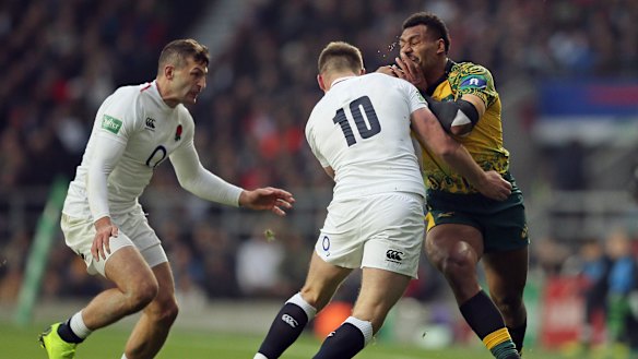 Fortunate: No.10 Owen Farrell, seen here tackling Australia's Samu Kerevi, escaped punishment for a hit on Izack Rodda.
