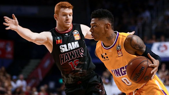 Didi Louzada of the Kings drives to the basket against Illawarra Hawks at WIN Entertainment Centre.