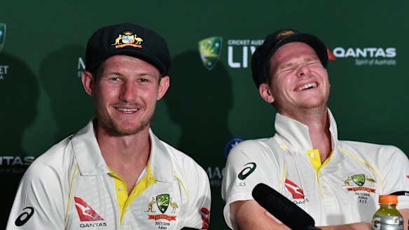 Butt of the joke: Cameron Bancroft (left) tells the story of his encounter with Jonny Bairstow as then skipper Steve Smith enjoys the tale.
