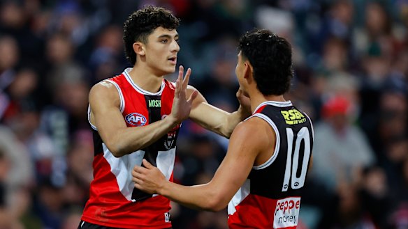 Caminiti celebrates a goal with teammate Mitch Owens.