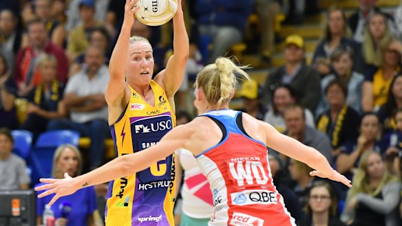 Lightning's Laura Langman (left) in action against the Swifts in last month's semi-final. 