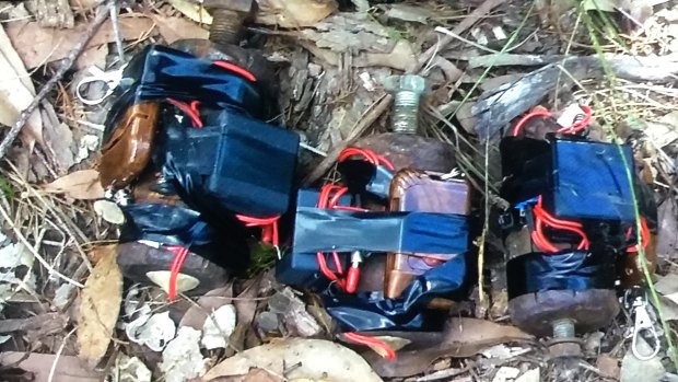 The AFP and Queensland Police have arrested a 56-year-old Boreen point man over a cache of improvised explosives and a modified rifle.