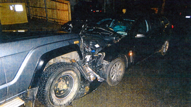 The aftermath of the crash when the parked Toyota (left) was hit by the Holden. 