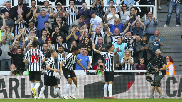Ayoze Perez, right, celebrates Newcastle's first goal.