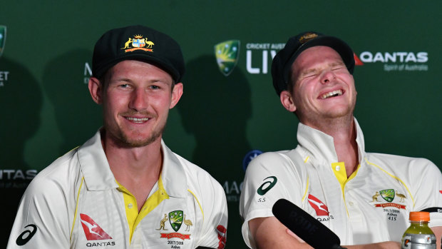 Butt of the joke: Cameron Bancroft (left) tells the story of his encounter with Jonny Bairstow as then skipper Steve Smith enjoys the tale.
