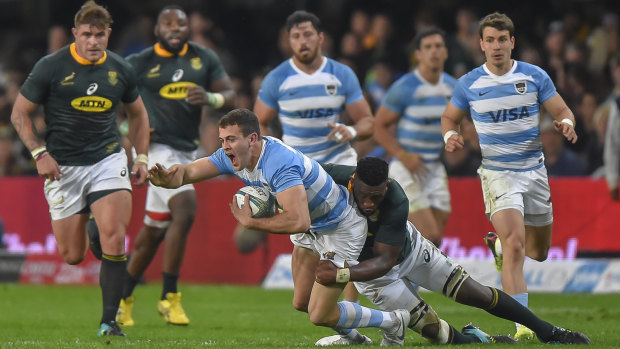 Tough test: Argentina full-back Emiliano Boffelli is tackled during their Rugby Championship loss to South Africa in Durban