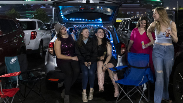 Swifties are taking over parking lots near the Eras Tour venues to sing along without having to enter the stadiums –  an act that fans have coined “Taylor-gating”.
