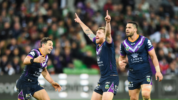 Making a point: Cameron Munster reacts after sealing victory for the Storm with a field goal against the Rabbitohs. 