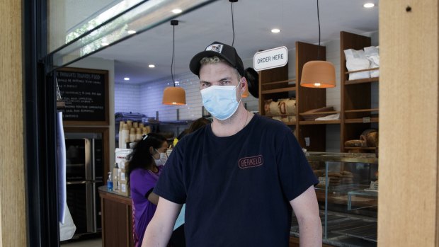 Cafe worker Andy Affleck was surprised at how quiet business was on the day the Northern Beaches reopened. 