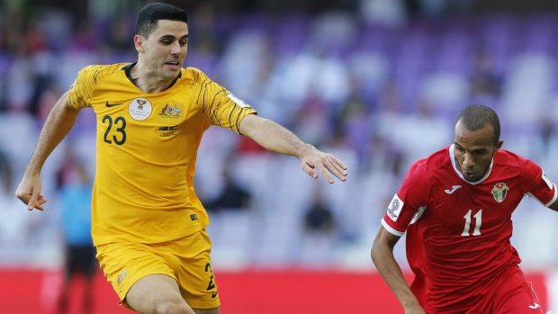 Unlucky break: Tom Rogic played most of the match against Jordan with a fractured hand.