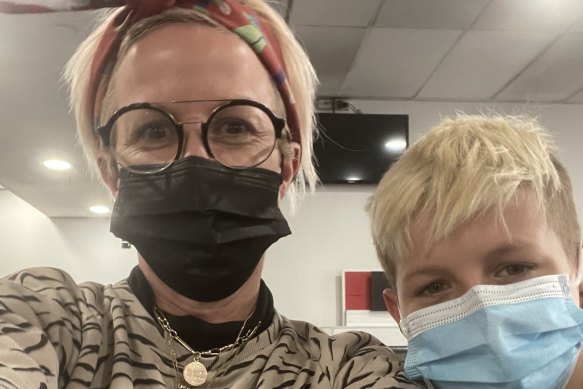 Aly Jolly and her 11-year-old son Johnny were at Melbourne Airport on Thursday morning, heading back to Sydney while they could.
