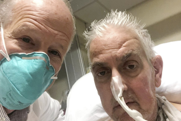 University of Maryland School of Medicine’s Dr Bartley Griffith takes a selfie photo with David Bennett snr, who received a pig heart.