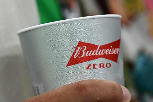 All the alcohol content of water: A close up of Budweiser cup at the FIFA World Cup Qatar.