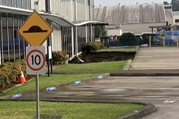 A sinkhole appeared under a Rockdale office building on Friday.