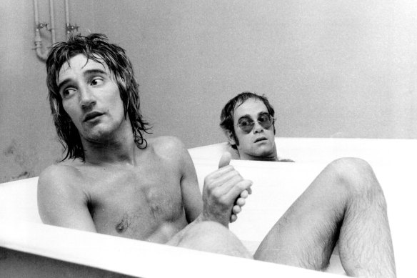 Rod Stewart and Elton John have baths after a training session with Watford.